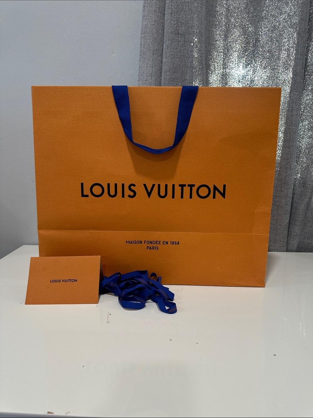 Authentic Louis Vuitton empty Orange Gift Bag with Blue ribbon and envelope